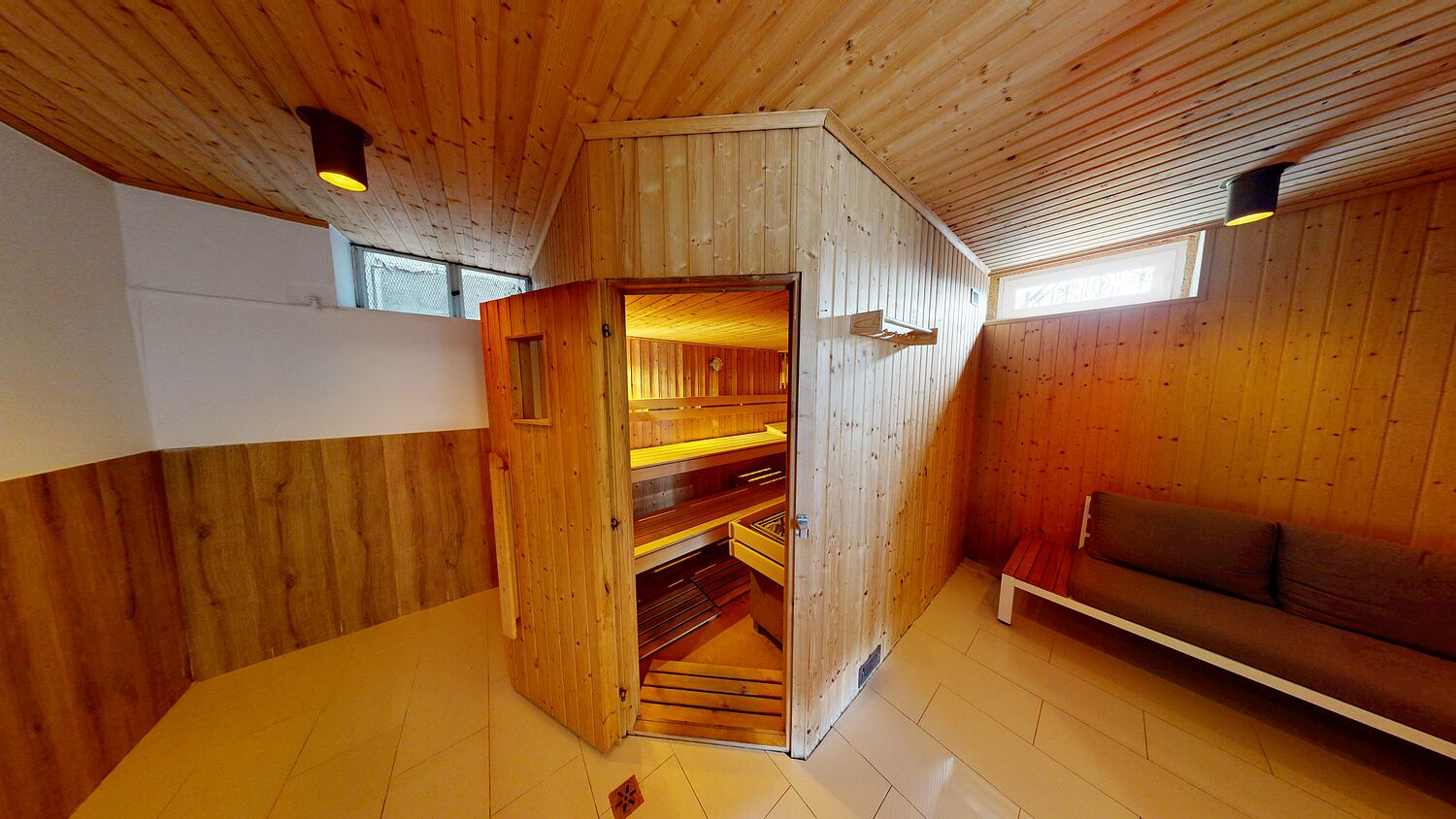 Finnish sauna in pale timber.